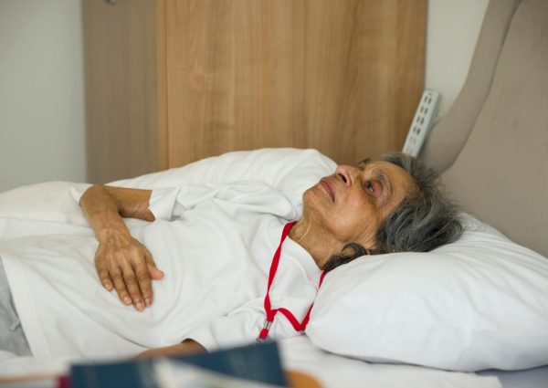 Frail,Old,Indian,Asian,Woman,Lying,In,Bed,In,A Frail,Old,Indian,Asian,Woman,Lying,In,Bed,In,A