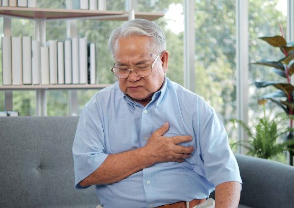 Elderly,Asian,Man,With,Chest,Pain,Suffering,From,Heart,Attack. Elderly,Asian,Man,With,Chest,Pain,Suffering,From,Heart,Attack.